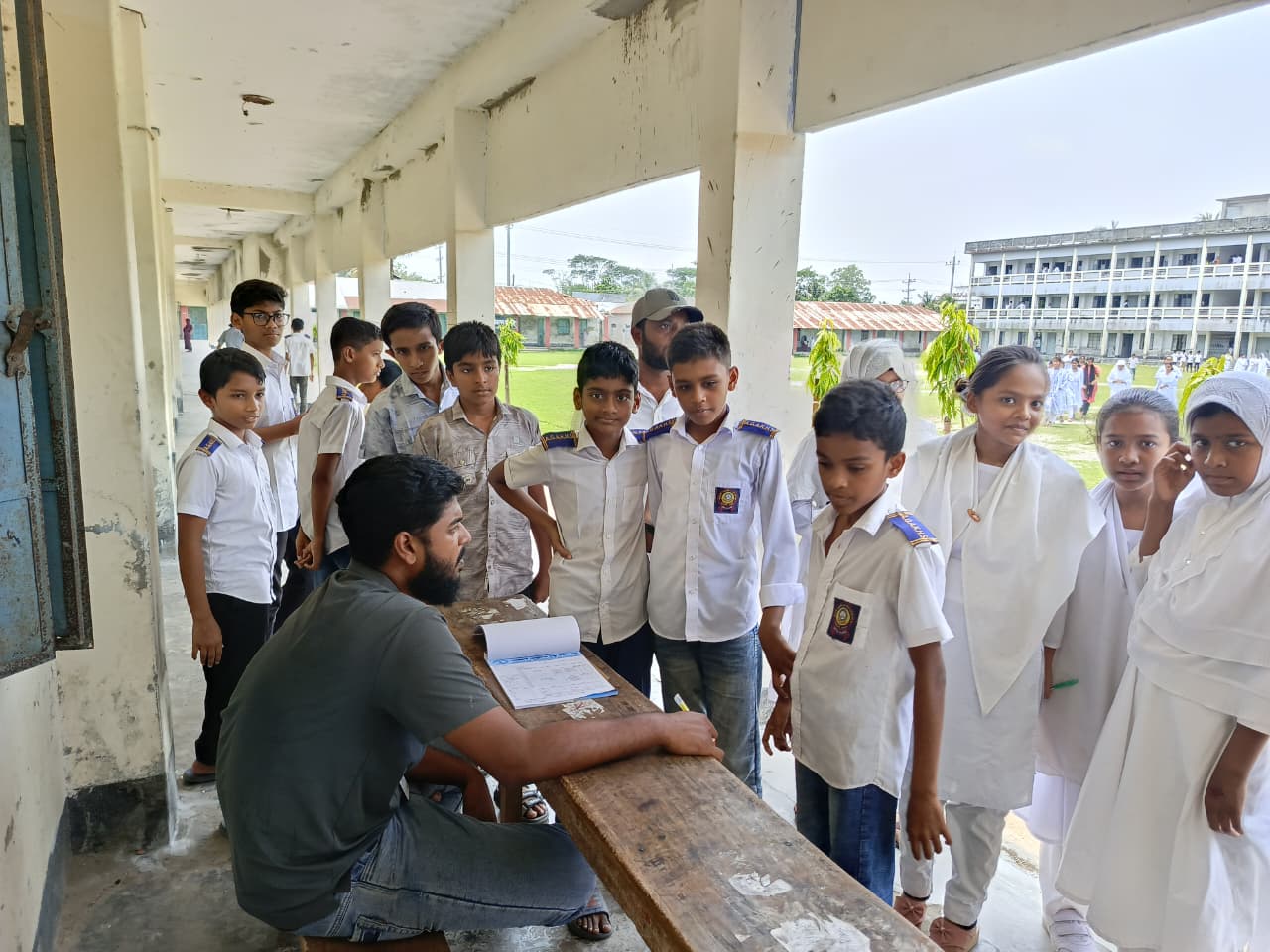 Student registration and screening during an eye camp by Amtali Modern Eye Hospital